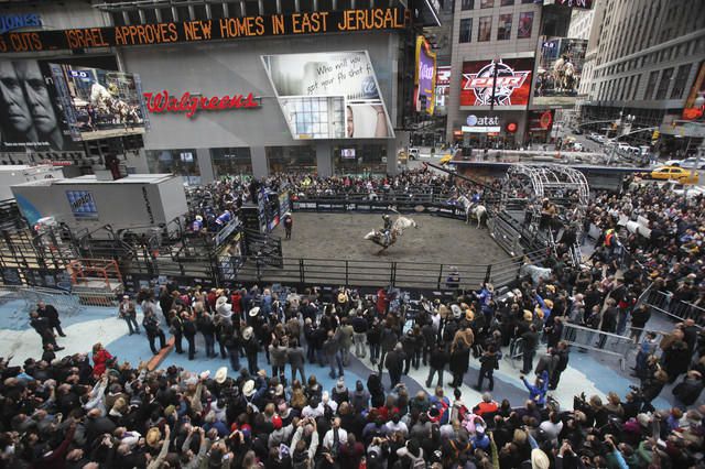 Professional bull riders in Times Square